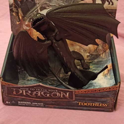 Educational toy set like new with learning board, dragon figure, animal cubes, and Nemo truck