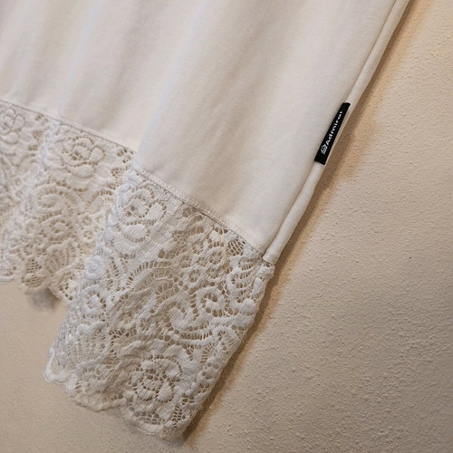 White Sleeveless Blouse