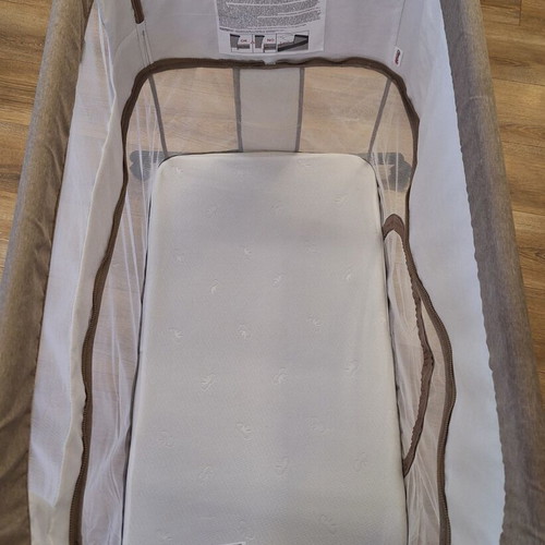 Chipolino double-level baby cot with mosquito net and wheels