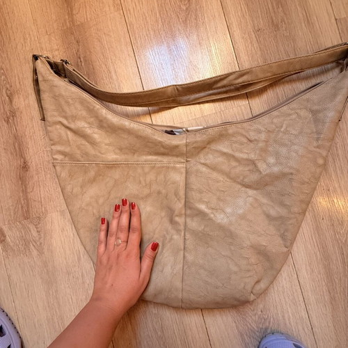 Crossbody bag beige like new with large storage space, banana style