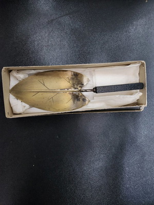 Vintage garden shovel in leaf shape used