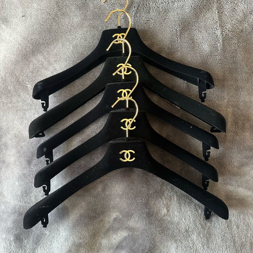 Chanel set of 5 new hangers with metal CC logo