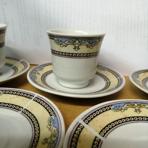 Porcelain coffee cups set of 2 with 5 saucers like new