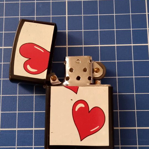 Lighter with hearts like new