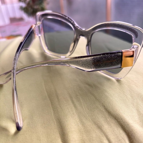 Dolce & Gabbana women's light grey plastic sunglasses like new