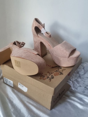 Platform shoes new, plush heels, size 40
