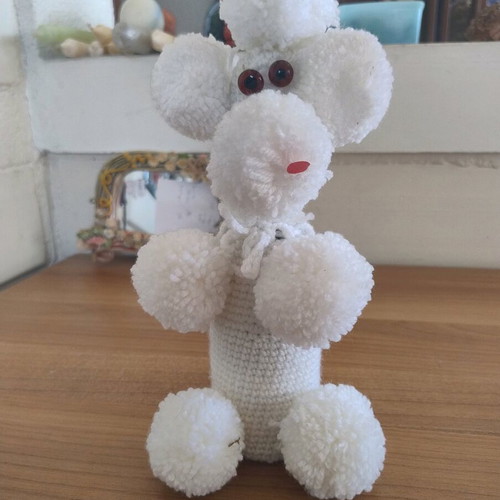 Faber champagne or wine bottle with knitted white dog