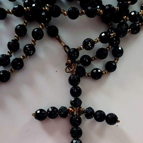 Rosary with black glossy beads like new