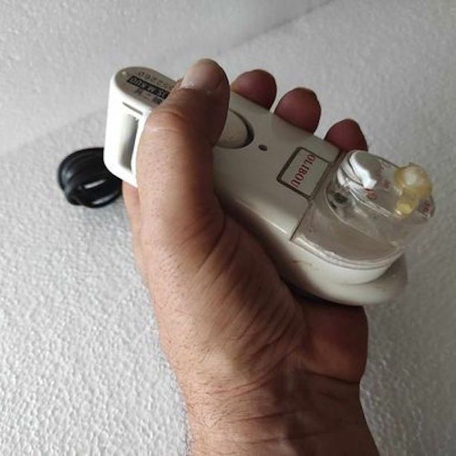 Mini travel iron like new with water and foldable design