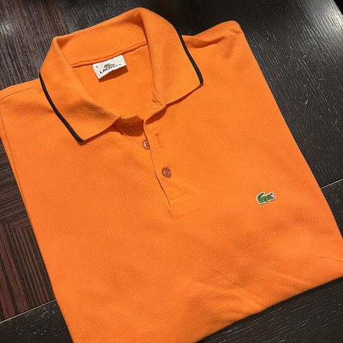 Lacoste polo shirt used, size L, orange