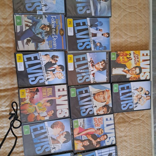 Elvis Presley collectible DVDs sealed in cases, pack of 12