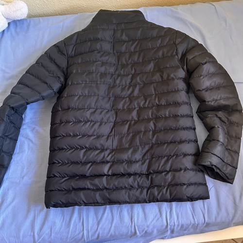 The North Face black jacket, logo faded
