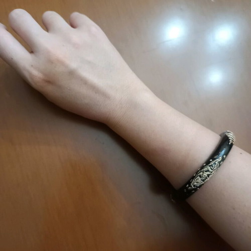 Wooden boho bracelet with embossed designs new, black