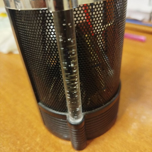 Pen holder with built-in electronic clock used
