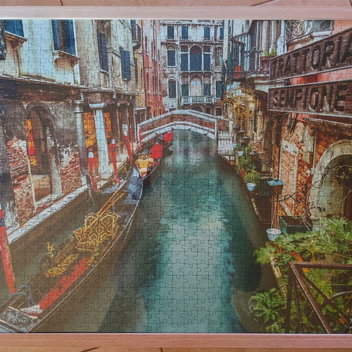 Framed puzzle like new, dimensions 0.53x0.73 m