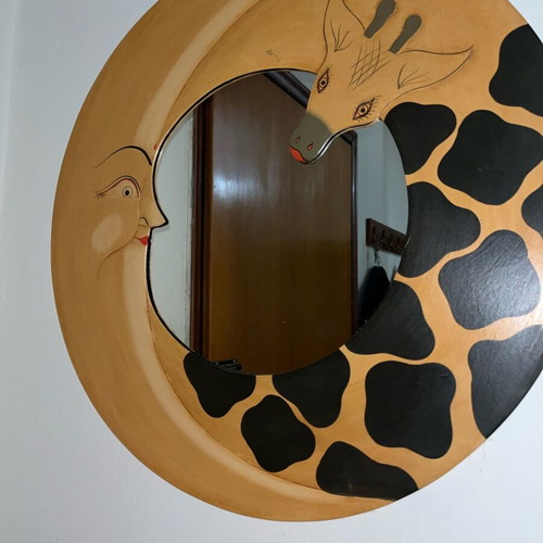 Round mirror with moon and giraffe design