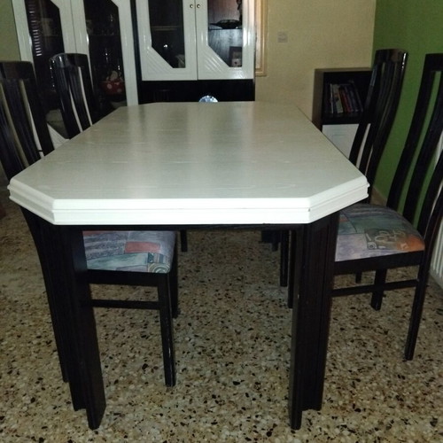 Dining set used, missing one glass from one unit