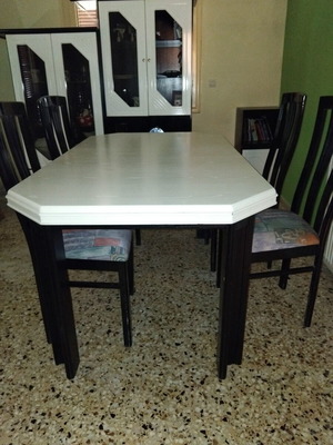 Dining set used, missing one glass from one unit