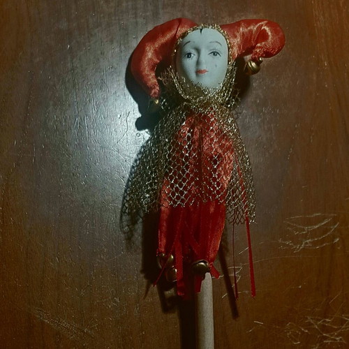 Decorative Harlequin figure on stick like new, red costume
