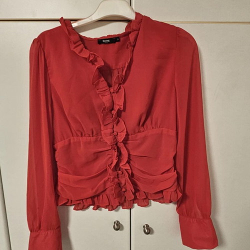 Red blouse with ruffles and buttons, like new, size M
