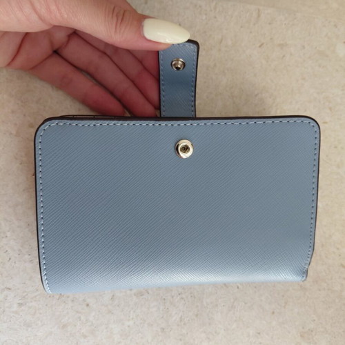 Kate Spade wallet new, turquoise with multiple card slots