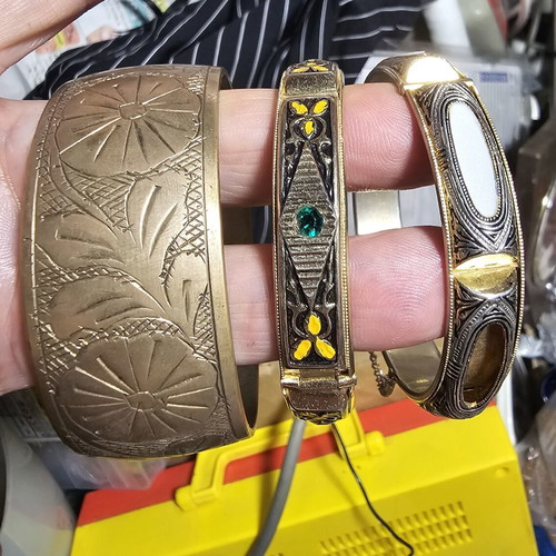 Vintage women's bracelet set used, one missing a stone