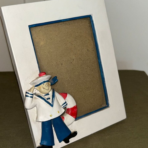 Nautical themed table photo frame with sailor and lifebuoy, polyresin