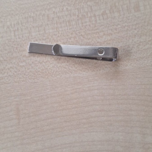 Silver tie clip used, gray