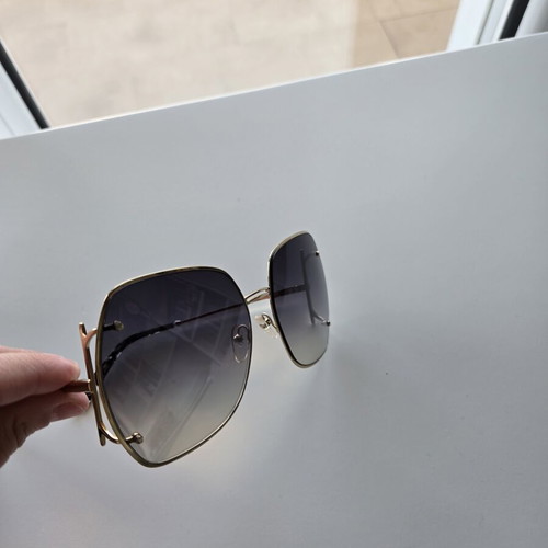 Salvatore Ferragamo sunglasses new, gold color