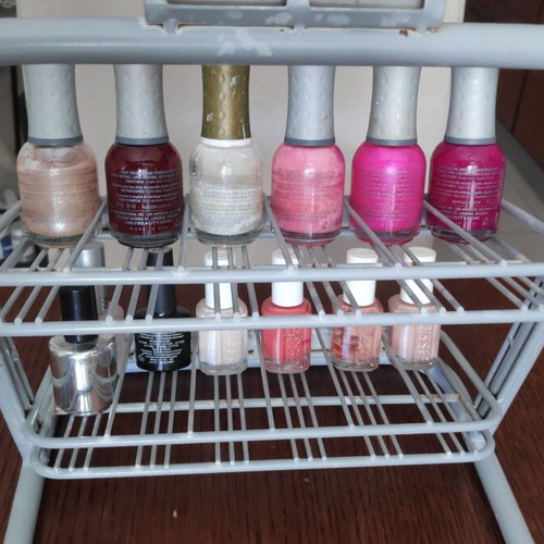 Orly metal tabletop stand with 36 slots for nail polishes used