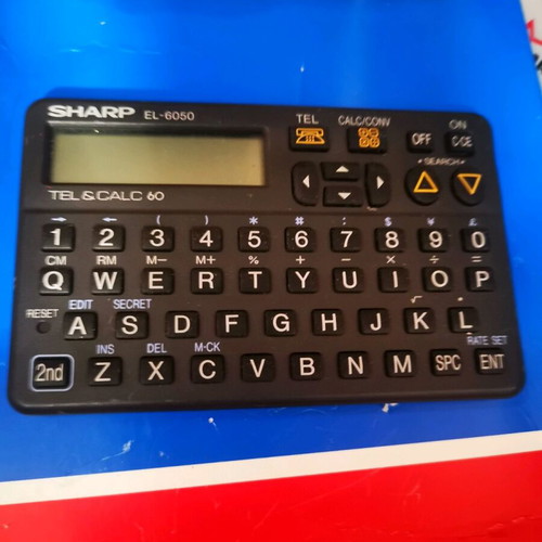 Sharp calculator used in good condition