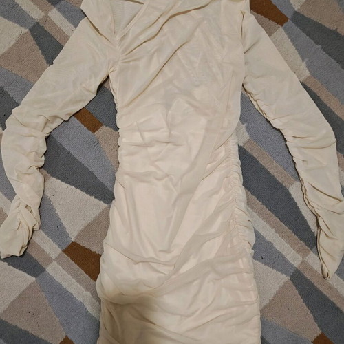 Cream dress new size M with high elasticity