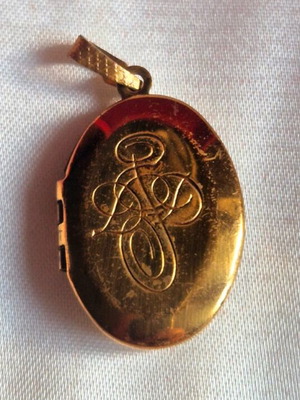 Antique pendant like new, gold-colored