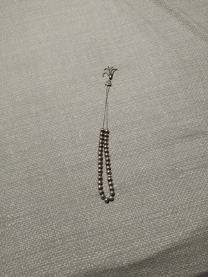 Silver komboloi with 35 beads and two cutters, like new