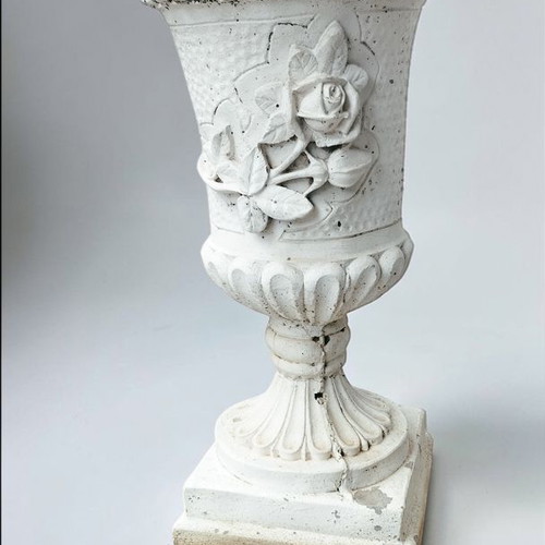 Cement garden urn Roman style used with patina decorative