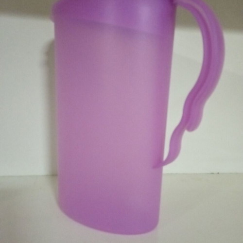 Expression jug 2 liters purple color new Tupperware