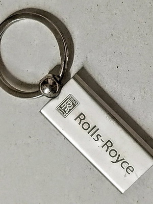 Rolls-Royce keychain like new, silver with pearl finish