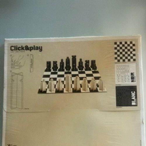 Chess game new, plastic laminated board for beginners