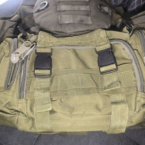 Tactical Vest used with first aid kit and magazine pouches