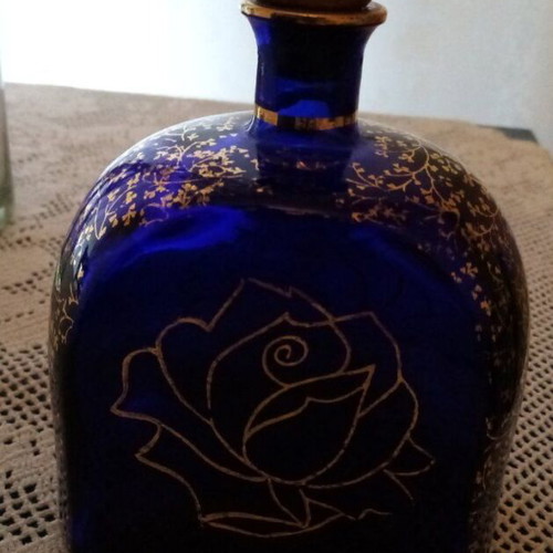 Small blown glass canteen used, dark blue with gold details
