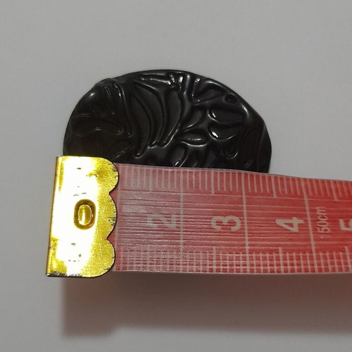 Decorative button dark brown with glossy embossed design new
