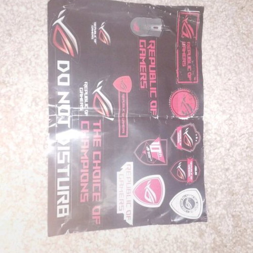 Asus stickers used, pack of 12, some creased