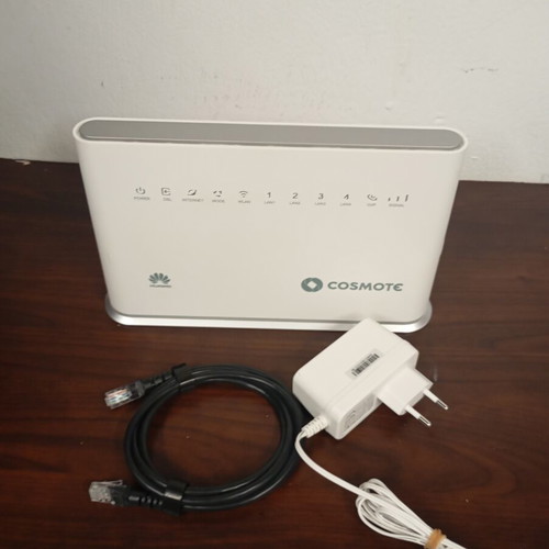Cosmote hybrid access point with SIM card port
