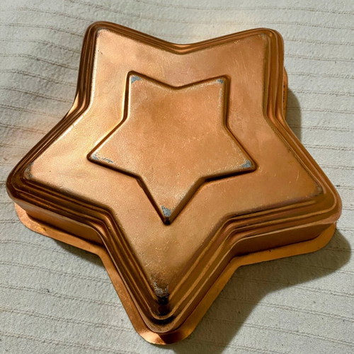Copper star-shaped baking mold used, vintage