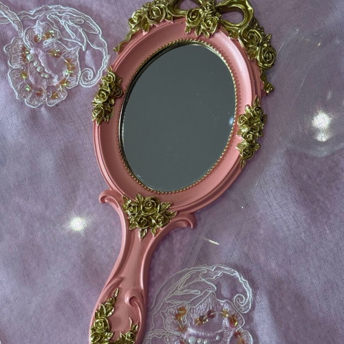 Vintage pink hand mirror like new