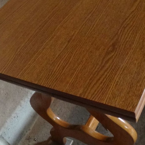 Wooden dining table used with extension