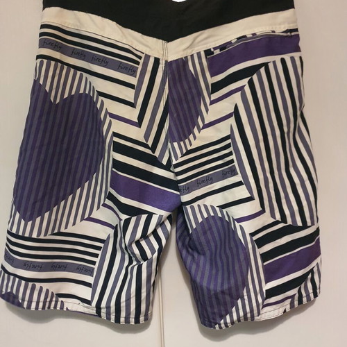 Firefly swim shorts with patterns size L like new, black and purple