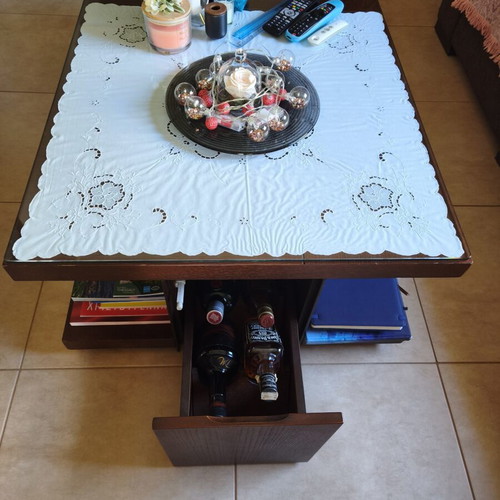 Coffee table used with four drawers and hidden compartment, wood