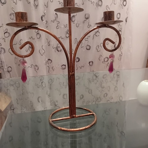 Metal candlestick with copper-bronze finish and purple beads, like new