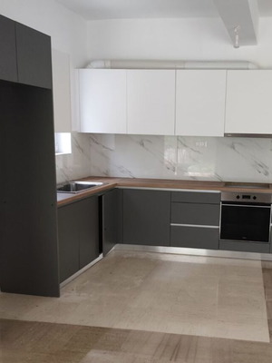 Kitchen with cabinets and countertop like new, including sink